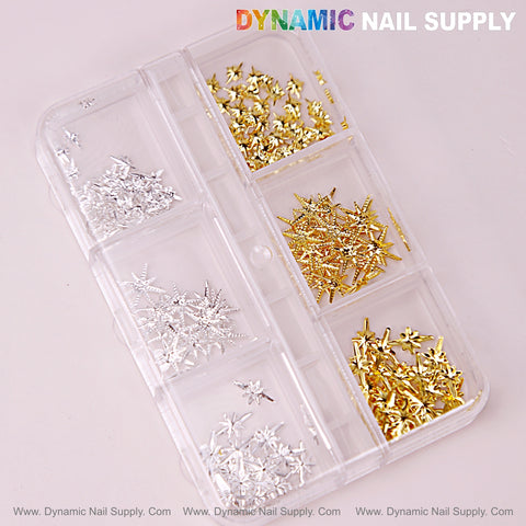 Plastic case holds Gold and Silver Stars Mixed Sizes Sparkling Charms for Nail DIY Designs on a pink background.
