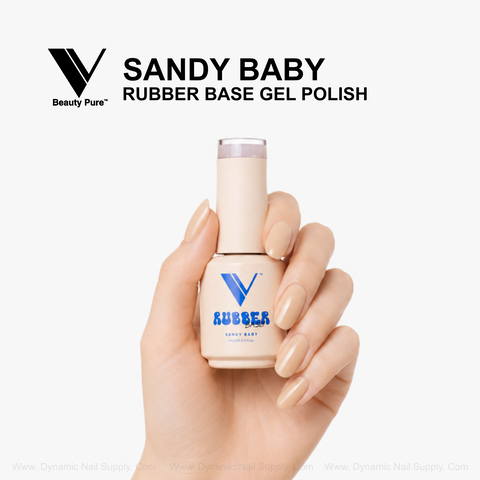 A manicured hand holds Sandy Baby - V Beauty Pure Rubber Base Gel for a flawless nude finish.