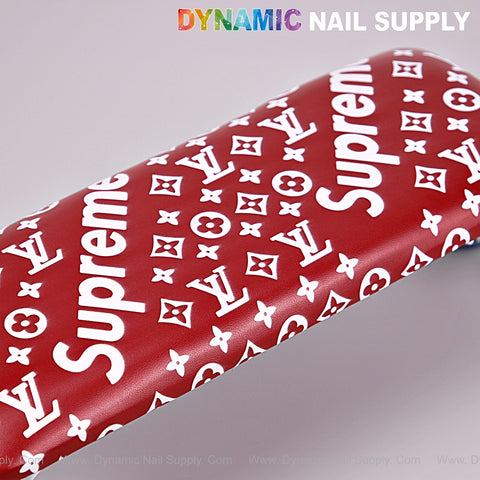 Dark red [R-M010] handrest armrest with white Supreme/Louis Vuitton pattern for pedicure and manicure service.