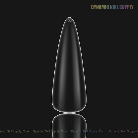 A Sculpted Stiletto XL Full Cover Soft-Gel Nail Tip (Black Box) is centered on a black background with branding.