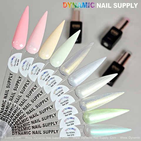 Eight long, pointed nail samples in pastel and iridescent shades with Dynamic No-HEMA Gel Polish (261-270) bottles behind.