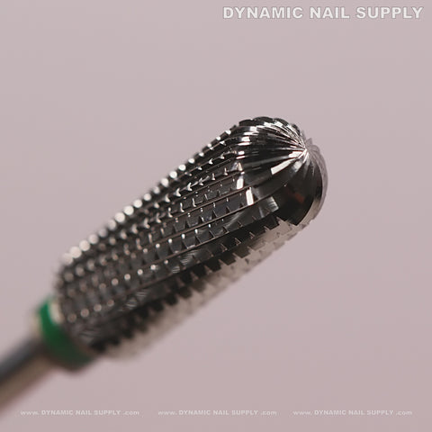 Close-up of the Cross Spiral Cut Coarse Removal Bit Round Top on a soft pink background.