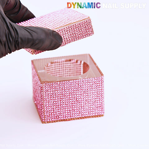 A gloved hand lifts the lid of the Rhinestone Square Pink Dappen Dish—Monomer Glass Crystal Cup for professionals.