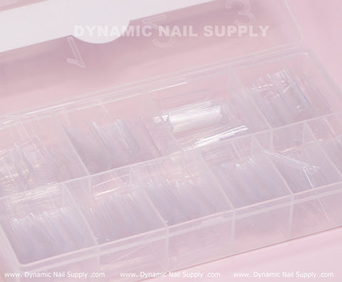 XL Square Nail Tips (Not C-Curve), extra long straight shape, organized in a clear box on a pink background.