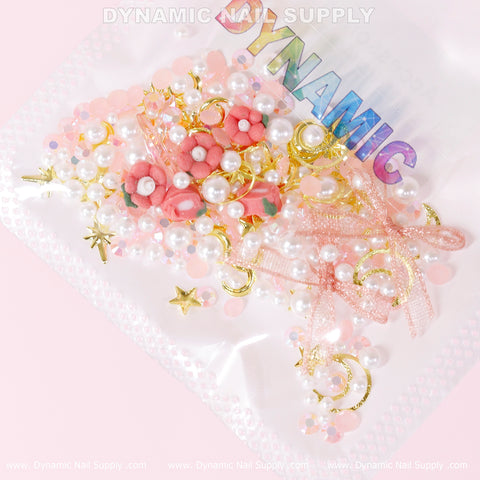 Luxury White Pearls, Gold Moons & Stars Set (Light Pink Theme) for dreamy nail art on a pastel background.