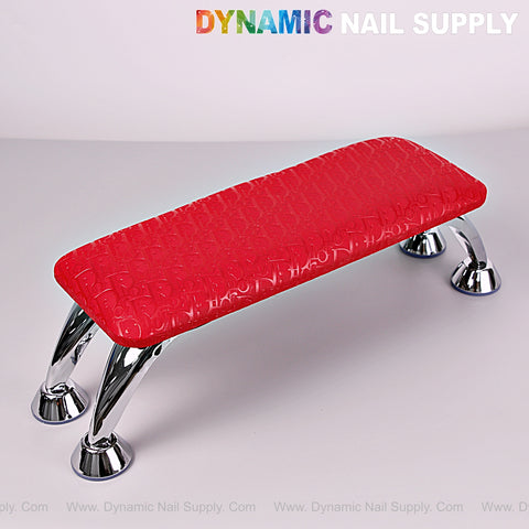 [R-M001] Red Di0r Pattern Handrest Armrest for pedicure/manicure with silver curved legs on white.