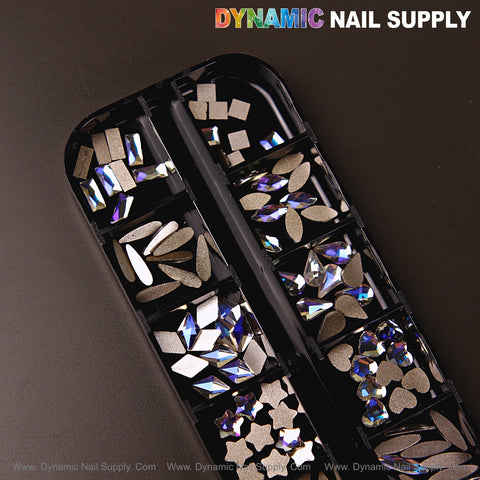 A black case displays Crystal Blue AB 6 mixed nail art rhinestones in heart, moon, square, and raindrop shapes.