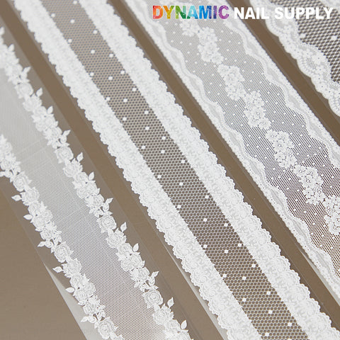 White Mixed Design Nail Foil 4: four white lace nail foils on brown, perfect for design foil lovers by DYNAMIC NAIL SUPPLY.