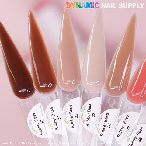 Displayed are six nail polish swatches from the "(BIAB) Rubber Base gel (Builder Gel in a Bottle) Number 30 to 39 collection" by Dynamic Nail Supply, featuring a variety of nude shades that range from deep brown to soft beige. Set against a white background with "DYNAMIC NAIL SUPPLY" prominently featured at the top, each color is shown on a clear plastic tip with corresponding labels akin to soak-off gel.