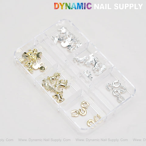 Organizer box with Horse Horseshoe Gold and Silver Nail Art Charms for DIY, sorted in separate compartments.