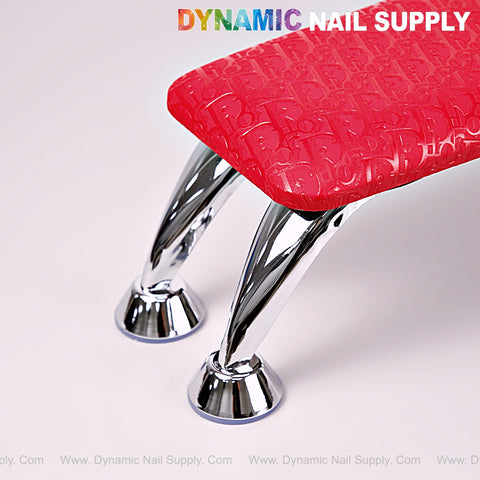 [R-M001] Red Di0r Pattern handrest armrest, ideal for manicure/pedicure, with DYNAMIC NAIL SUPPLY logo and chrome legs.