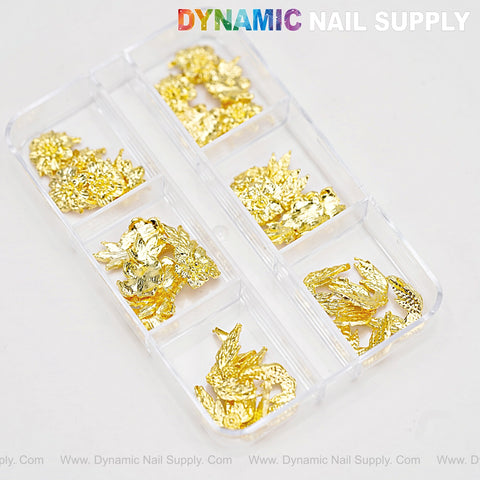 Clear tray holds 6 sections of Gold Flowers and Wings Charms for Nail Art DIY Designs, perfect for creative decorating.