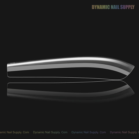 A Sculpted Coffin (XL) Full Cover Soft-Gel Nail Tip (Black Box) is shown side view on black with a soft reflection.