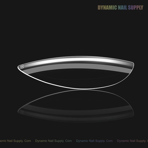 A clear, curved Natural Round (Short) Soft-Gel Nail Tip in a pink box on black with Dynamic Nail Supply text top right.