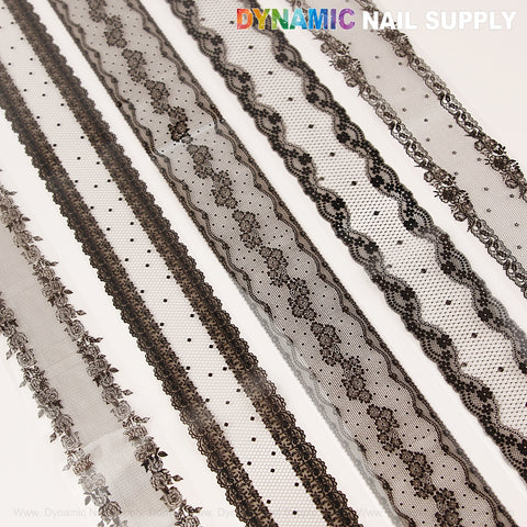 White and Black Lace Nail Foil 2: six floral and dotted design nail foils, arranged diagonally on a white background.