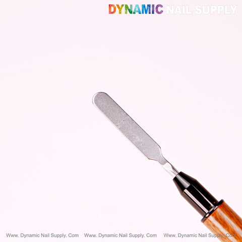 [Wood and Black] Dual Head Gel Brush with oval brush and spatula is angled on white; Dynamic Nail Supply at top.