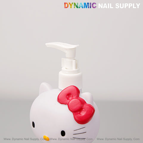 A cute white Hello Kitty Small Lotion & Soap Dispenser Bottle with a red bow and “Dynamic Nail Supply” logo.