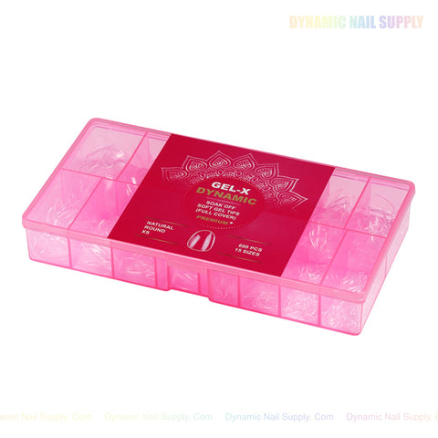 A pink box labeled GEL-X DYNAMIC holds 600 Natural Round XS Full Cover Soft-Gel Nail Tips.