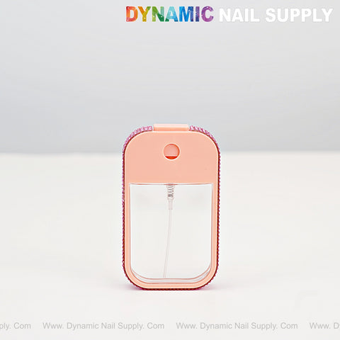 The [Pink Rhinestone] 50ml card shape spray bottle is a pocket-size hand sanitizer from DYNAMIC NAIL SUPPLY.