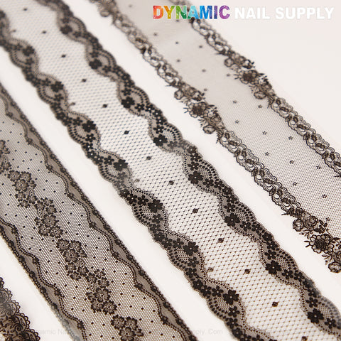 White and Black Lace Nail Foil 2 creates bold nail art with floral and geometric black lace patterns on white foil.