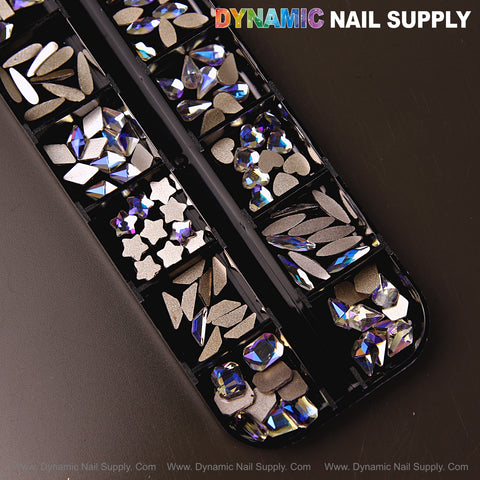A black case holds Crystal Blue AB 6 mixed rhinestones—raindrop, square, heart & moon—under DYNAMIC NAIL SUPPLY.