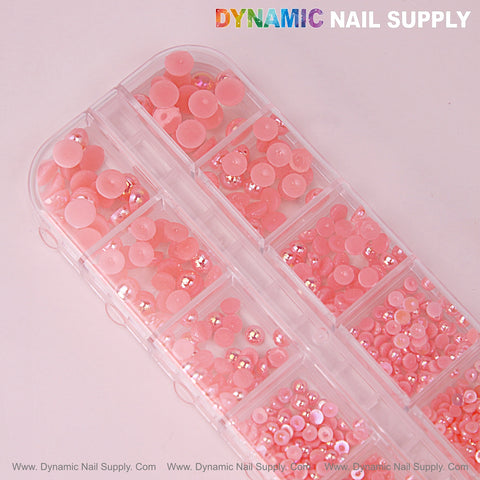 12 grid Pink Pearl Beads Nail Charms with mixed sizes and flatback stones in a clear, sectioned container.