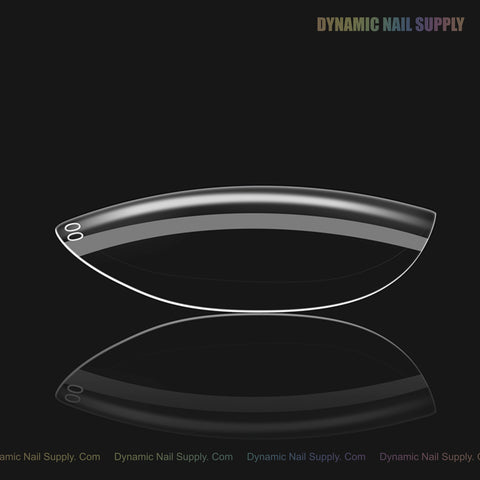A glossy, clear Natural Round XS Full Cover Soft-Gel Nail Tip (Pink Box) on black with rainbow “Dynamic Nail Supply” text.