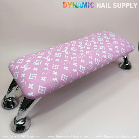Pink Hello Kitty LV Nails Pillow ArmRest—leather cushion, silver legs; perfect chic manicure/pedicure accessory.