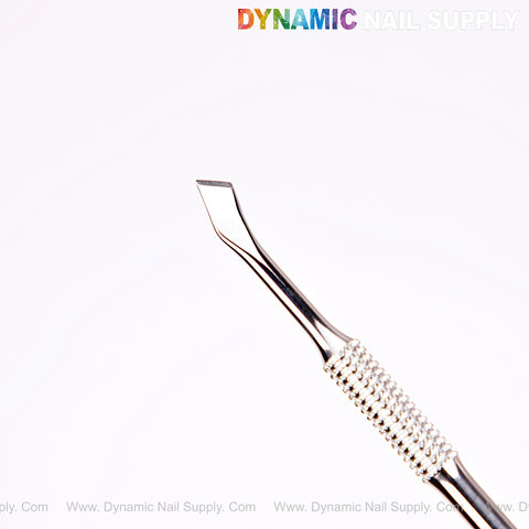NT1234 – Professional Double-Function Cuticle Pusher with a textured grip is shown against a white background.