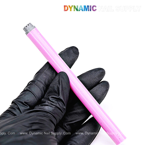 A gloved hand holds a pink Silicone Stamper Pen for Nail Art Design; DYNAMIC NAIL SUPPLY is in the top right.