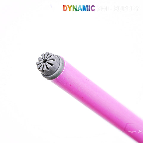 Close-up of a pink Silicone Stamper Pen for Nail Art Design with a grey star-shaped tip on a white background.