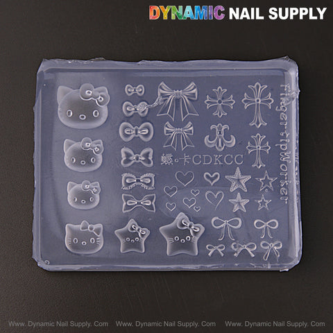 3D silicone mold for custom Hello Kitty, bows, hearts & cross nail art charms—perfect for cute embossed DIY nails.