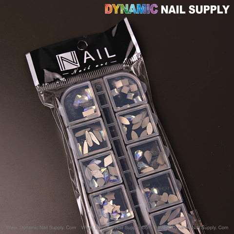 A plastic case of Crystal Blue AB 6 Mixed 12 Shapes Nail Art Rhinestone Gems, labeled Dynamic Nail Supply.