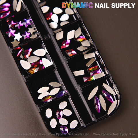 The [Fuchsia AB 8] case holds mixed 12-shape fuchsia AB rhinestone gems for nail art on a dark background.