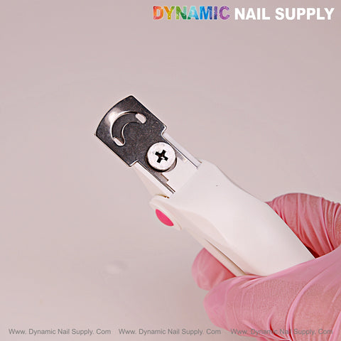 A gloved hand holds the Nail Tip Cutter With Measure Spacers; DYNAMIC NAIL SUPPLY appears in the corner.