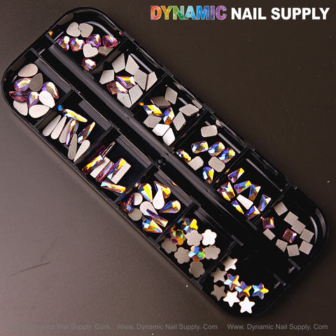 The Volcano AB 7 set includes 12 mixed raindrop, square, heart, and moon rhinestone gems for creative nail art.