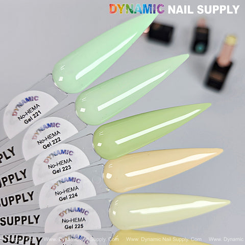 Five pastel green, yellow, and peach swatches display our Dynamic No-HEMA Gel Polish (221–230) on a gray background.