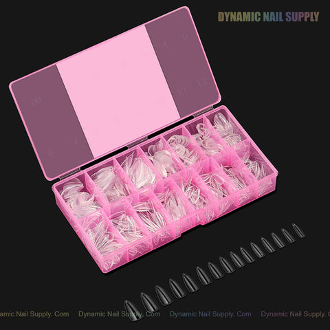 A pink box of Natural Stiletto (Medium) Soft-Gel Nail Tips is shown with black tips displayed in front on black.