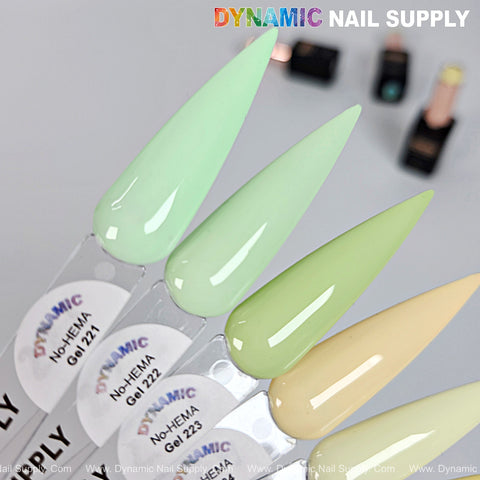 Four pastel green and yellow swatches of Dynamic No-HEMA Gel Polish (Color 221-230) for long-lasting nail color.