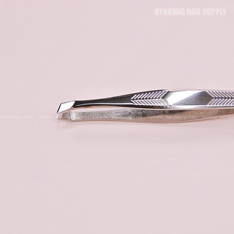 N407 - Professional Slanted Head Tweezer Stainless Steel with etched handle, shown on a pale pink background.