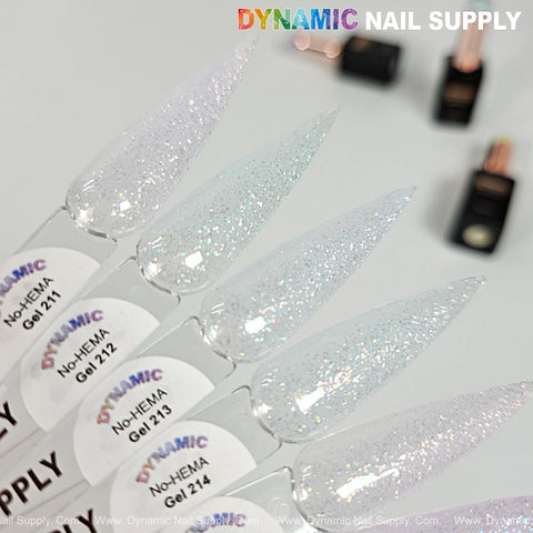 Five pointed acrylics with silver glitter labeled 211–220; Dynamic No-HEMA Gel Polish bottles blurred in background.