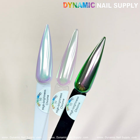 Three nail polish samples are presented on individual swatch sticks. From left to right: Light-Mermaid Iridescent Chrome #10, featuring a light, pearlescent shade with a blue tint; a pinkish hue; and an iridescent chrome finish that is ideal for any Nail Art Design. The plain background highlights "Dynamic Nail Supply" written in multicolored text at the top.
