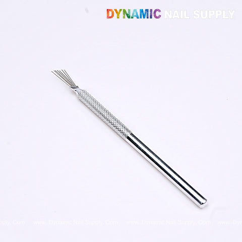 A Nail Art Manicure Stainless Steel Brush, multipurpose clamping tool, shown under the DYNAMIC NAIL SUPPLY logo.
