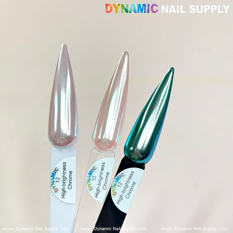 Three vertically displayed swatches showcase pointed nail polish designs. The first, labeled "High-Brightness Chrome by Dynamic Nail Supply," features the Light-Pearl Transparent Iridescent Chrome #12 in a pearl white finish on a white stick. The second swatch is in light pink on a clear stick, while the third displays metallic teal with chrome-pigment on a black stick, both also noted as part of the High-Brightness Chrome collection by Dynamic Nail Supply.