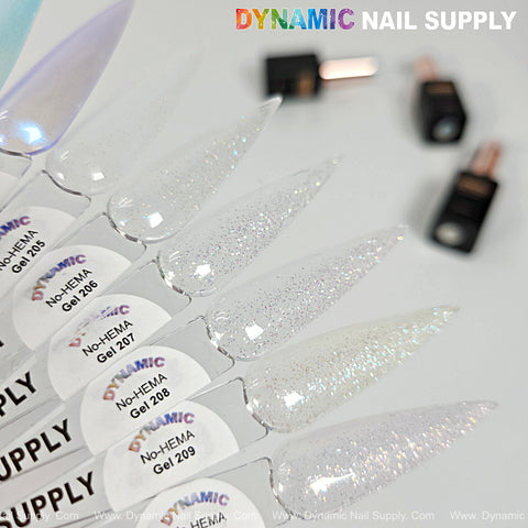 Five long nail swatches in clear and glitter Dynamic No-HEMA Gel Polish (Color 201–210), bottles in the background.