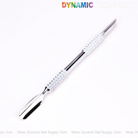 NT1231 – Professional Double-Function Cuticle Pusher (Bevel and Spoon) with textured grip, shown diagonally on white.