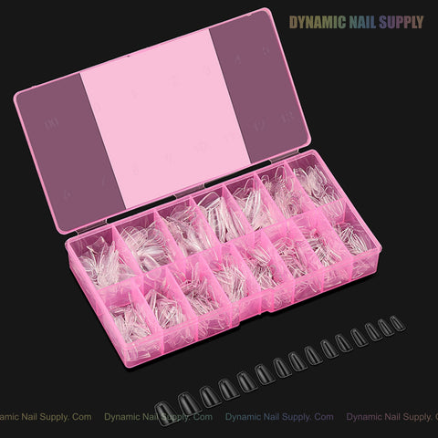 Natural Coffin (Short) Soft-Gel Nail Tips in a pink box with compartments; black tips lined up in front.