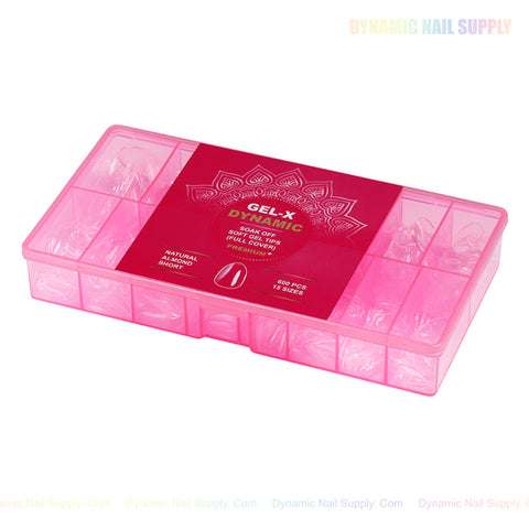 A pink box labeled “Natural Almond (Short) Full Cover Soft-Gel Nail Tips” holds tips in compartments for easy extensions.