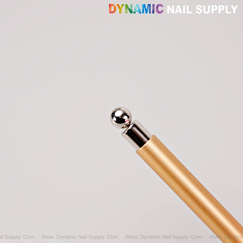 A [Gold] Dual Head Strong Cat Eye Magnet with Ball Tip under the DYNAMIC NAIL SUPPLY logo on a plain background.