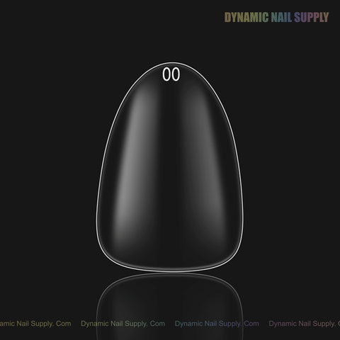 A single Natural Almond (Short) Full Cover Soft-Gel Nail Tip, size 00, is centered with product text above on a dark background.